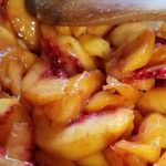 bowl of sliced fresh peaches