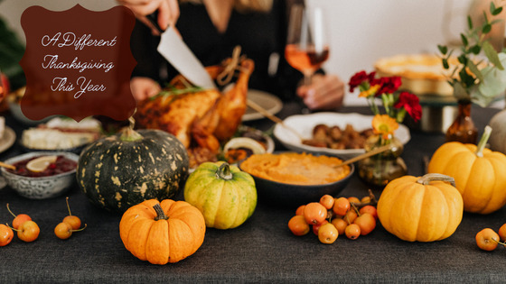 a photo of Thanksgiving Dinner, with the words - A different Thanksgiving This year. Used as the blog header for a post about thanksgiving dinner in Lancaster, PA